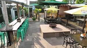 Fire Pit And Tables At Outdoor Bar