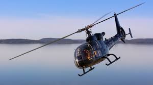 pilot fined after flying helicopter