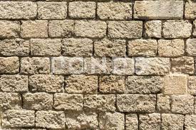 Masonry Wall Of Old Stone Blocks Of