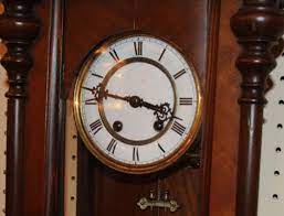 Carved Walnut Wall Clock C1890