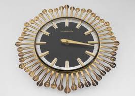 Modern Brass Sunburst Wall Clock