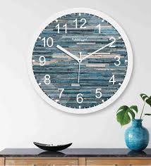 Buy Brown Wooden Embos Wall Clock By