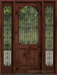 Rustic Entry Door With Wrought Iron