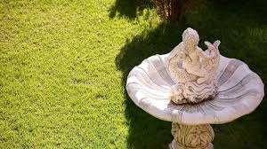 Posh Garden With Fountain And Statue