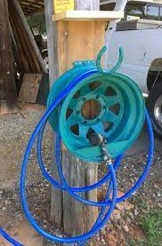 Hose Reel From Old Car Or Truck Wheel