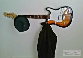 Ingenious Diy Shelving From An Old Guitar