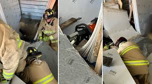 Firefighters Rescue Worker From Pile Of
