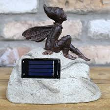 A Fairy Figure On A Stone Solar Powered