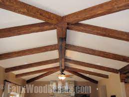 how to install beams on a stucco or