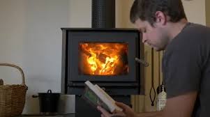 Man Readin By Fireplace Slow Motion