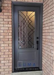 Grey Steel Door With Iron Design Glass