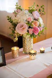 Flowers And Gold Mercury Glass Vases On