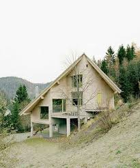 Amunt Forms Wooden House On A Hill In