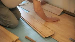 Man Installs Laminate Floor Diy Stock