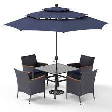 Blue Umbrella And Rattan Chairs
