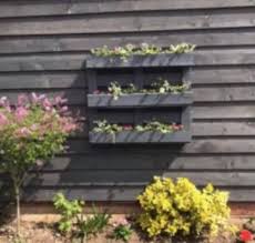 Woman Reuses Wooden Pallets To Make