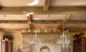 installing wood beams on a ceiling