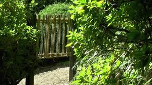 Bamboo Gate On A Path In A Japanese