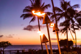 Hawaii Sunset With Fire Torches