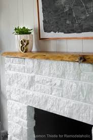 wood mantel on a masonry fireplace