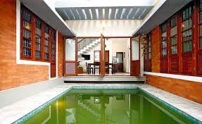 Kerala House Built Around A Pool Pond