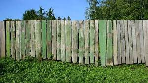 Plank Fence With Ling Paint Stock