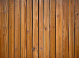 A Wall Of Brown Wooden Cladding With