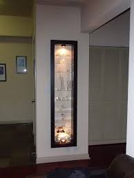 A Recessed Bertby Display Cabinet