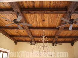 a coffered ceiling with beams