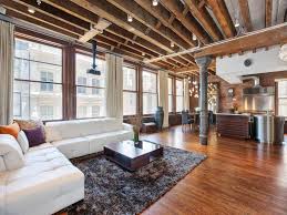 exposed wood beams and iron columns