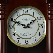 Bedford Clock Collection 27 5 In Classic Chiming Wall Clock With Swinging Pendulum Cherry Oak Finish