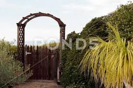 Natural Wood Picket Gate Opens To