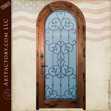 Arched Custom Entry Door With Fine Art