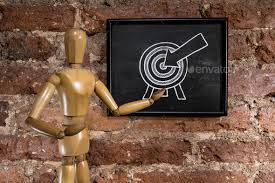Wooden Mannequin Showing A Target Icon