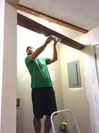 how to diy a faux wooden ceiling beam