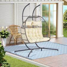 Cesicia 2 Person Swing Hanging Egg Rattan Chair Outdoor Patio Hammock With Beige Cushions