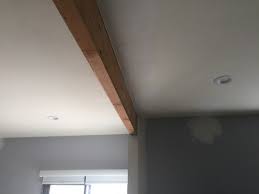 open floor plan support beam dry wall
