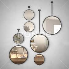 Round Mirrors Hanging On The Wall