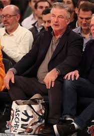 Alec Baldwin Takes A Courtside Seat As