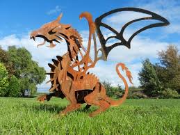 Rusty Metal Dragon Sculpture Flying