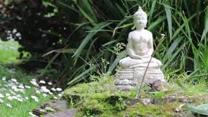 Stone Buddha In A Zen Garden Stock
