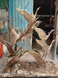 Fiber Carved Flying Bird Sculpture At