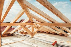 installation of wooden beams at house