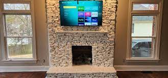 Tv Mounting Above A Stone Fireplace