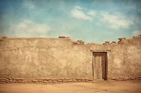 Weathered Adobe Walls In A Desert