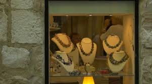 Necklaces Displayed In A Front Of