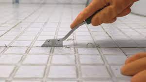 Housekeeper Remove Old Grout From