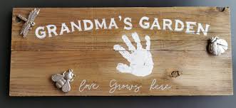A Rustic Garden Sign For Grandma In