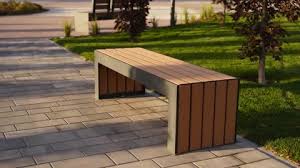 Modern Wooden Benches On The Lawn In