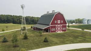 iconic red gambrel barn on a beautiful